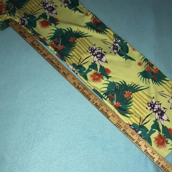 𝅺TROPICAL print jumpsuit cut out sides ties in back sexy slinky NEW size S - Picture 9 of 9